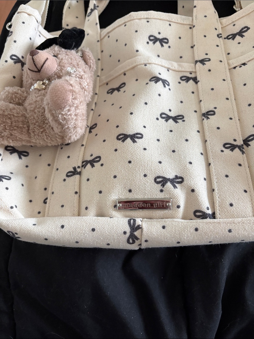 Madden girl. Cream Bow-Print Canvas Tote Bag with Bear Charm.